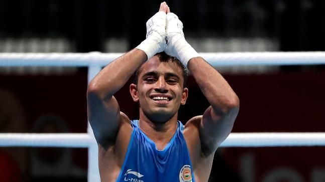 Gold medallist Amit's ancestral village erupts in joy