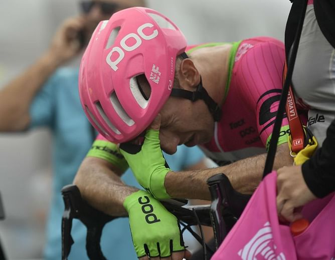 Yates loses time in Vuelta; Woods earns emotional stage win