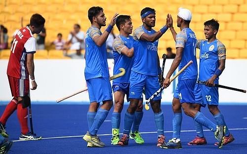 Defending champions India beat arch-rivals Pakistan 2-1 in a keenly-contested match to bag a consolation bronze medal in the men's hockey competition