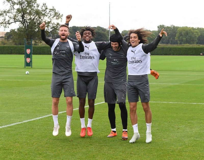 Alex Iwobi looks happy with the rest of his teammates after returning from injury