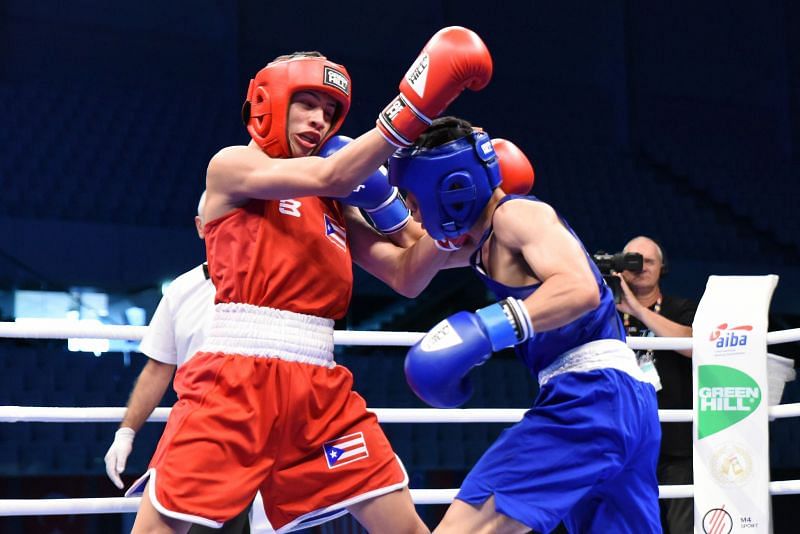 Thitisan Panmod of Thailand in blue won the Gold defeating Jan Paul Rivera of Puerto Rico (Image Courtesy: AIBA)