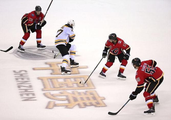 Bruins top Flames 4-3 in NHL preseason opener in China