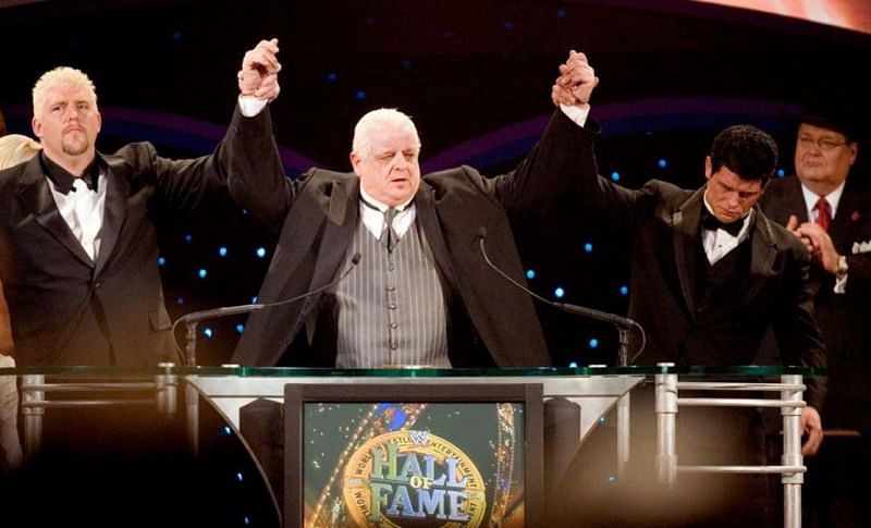 Dusty Rhodes (center) was a WWE Hall of Famer