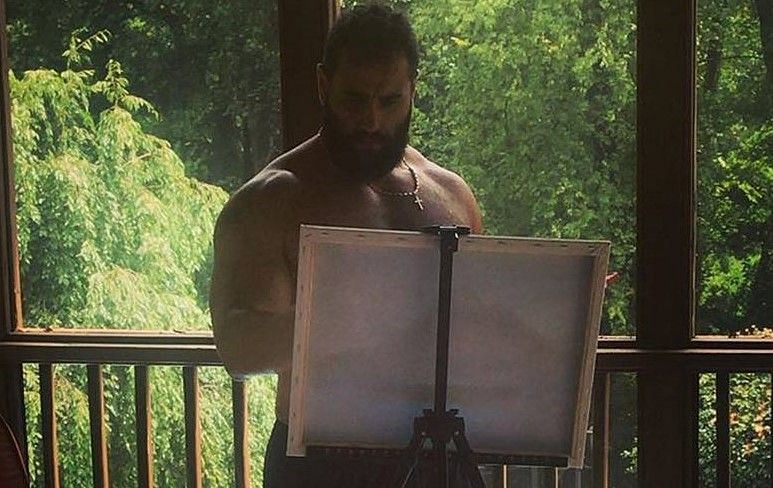 While Rusev now finds the time to paint art, he was forced to paint walls during his early days in America