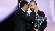 Iniesta with the winner of the Ballon d'Or that season, Lionel Messi.