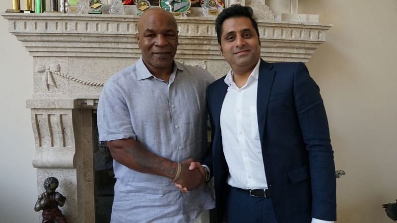 Mohamedali Budhwani pictured alongside the legendary Mike Tyson