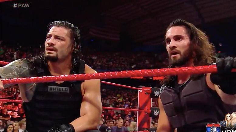 Roman Reigns and Seth Rollins trying to spot the mid-card titles in the WWE at the moment