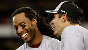 WATCH: Cardinals WR Fitzgerald tackles former QB Warner on sidelines