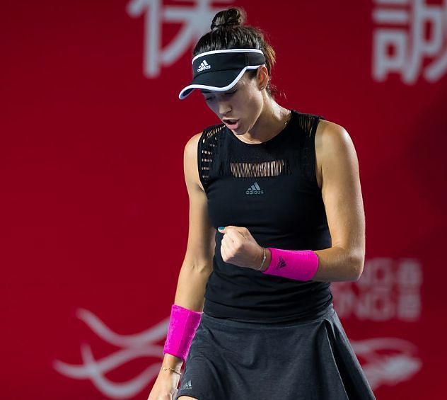 Garbine Muguruza clenches her fists in the success of a near perfect straight sets win at the Hong Kong Tennis Open