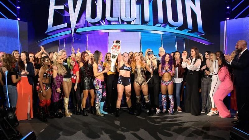 Ronda Rousey celebrating with other female wrestlers for the success of their first ever all women&#039;s pay-per-view