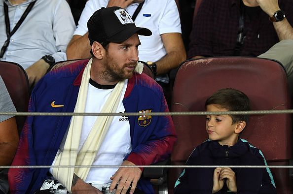 Messi is out with a broken arm and will be in the sidelines cheering his team