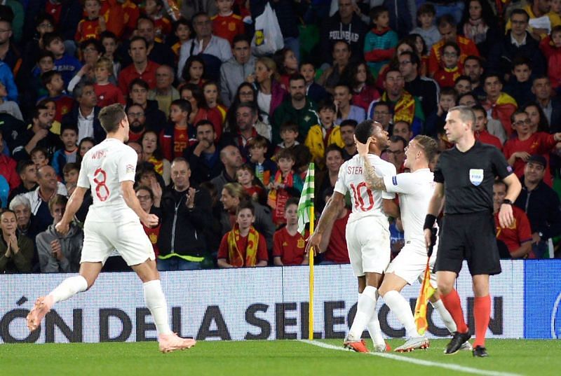 Raheem Sterling celebrates a goal against Spain