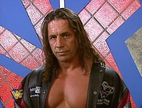 Bret Hart is standing by backstage...