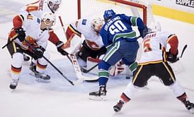 Pettersson scores 1st goal, Canucks beat Flames 5-2