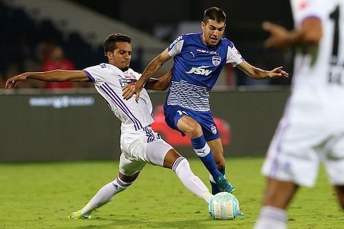 A file picture of Sahil Panwar of FC Pune City (left) in a tussle for possession with Bengaluru FC's Toni Dovale (Image: ISL)