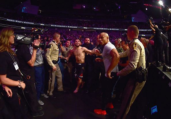 Ali Abdelaziz (in white) trying to control the post fight melee after UFC 229
