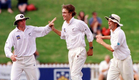 New Zealand&#039;s Daniel Vettori is congratulated by h