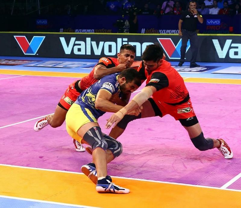 Ajay Thakur attempting to escape versus Bengaluru Bulls.