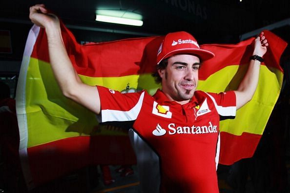 Alonso celebrates after winning the 2012 Malaysian Grand Prix