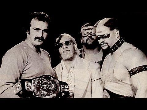 Jake Roberts with the Warriors and Paul Ellering