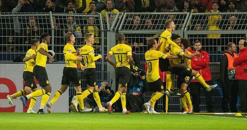 Dortmund players celebrating a goal.