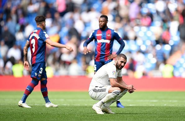 Benzema holds a disappointed look after the loss