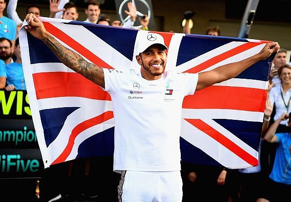 Lewis Hamilton celebrates winning the Mexican GP
