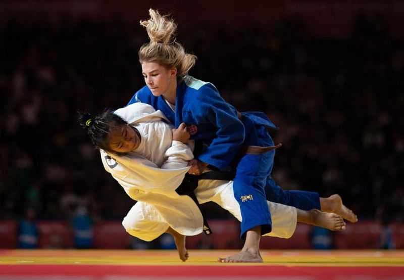 Thangjam of India in action against Ana Viktorija Puljiz of Croatia