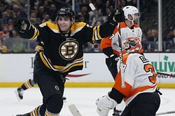 Chara scores twice, Halak stops 26 and Bruins top Flyers 3-0