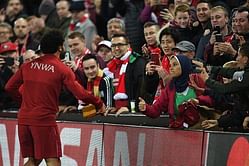 Mo Salah receives present from fan after handing over his shirt following Champions League win