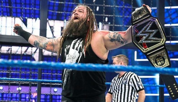 Bray Wyatt celebrates after winning the WWE championship.