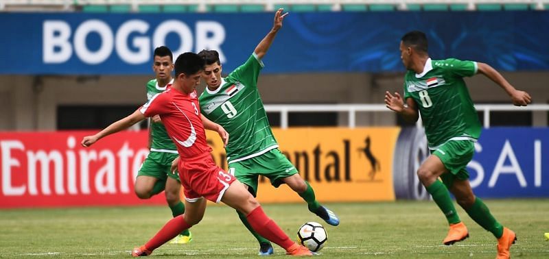 Pak Kwang-Chon in the red jersey scored the solitary goal against Iraq (Image Courtesy: AFC)
