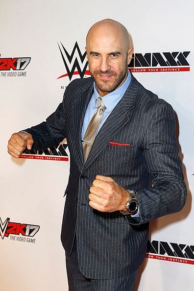 Looks good in a suit and probably would look better with a Universal Title or WWE Championship.