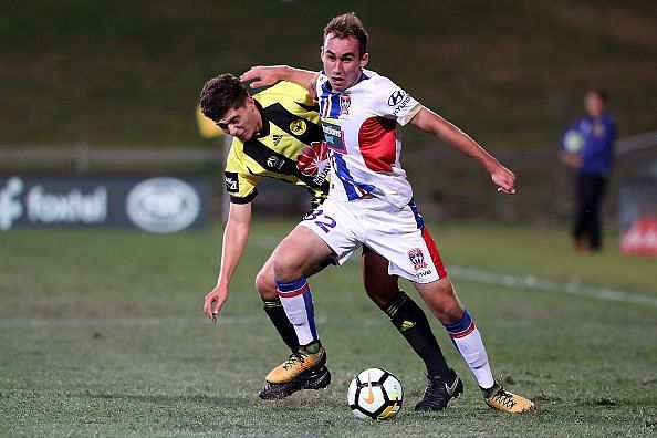 Australia&#039;s Angus Thurgate (in white jersey) plays for the Newcastle Jets in the Australian League
