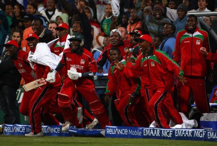 Zimbabwe players join their team-mates&Acirc;&nbsp;in celebrating their historic win against Australia