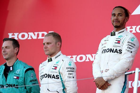 Hamilton stands on top of the podium at the F1 Grand Prix of Japan