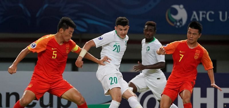 From L-R: China&#039;s Zhu Chenjie (5), Saudi&#039;s Abdullah Alhamddan (20) and China&#039;s Tao Qianglong (7) (Image Courtesy: AFC)