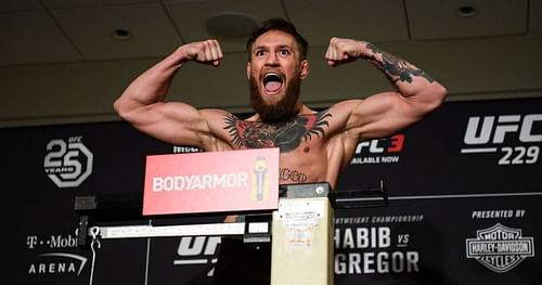 Conor McGregor weighs in at 154.5 pounds 