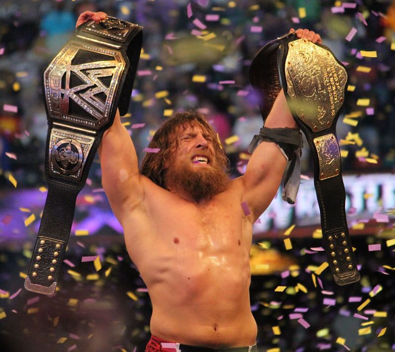 Daniel Bryan with the championships