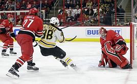 Marchand, Bruins stop Hurricanes 3-2