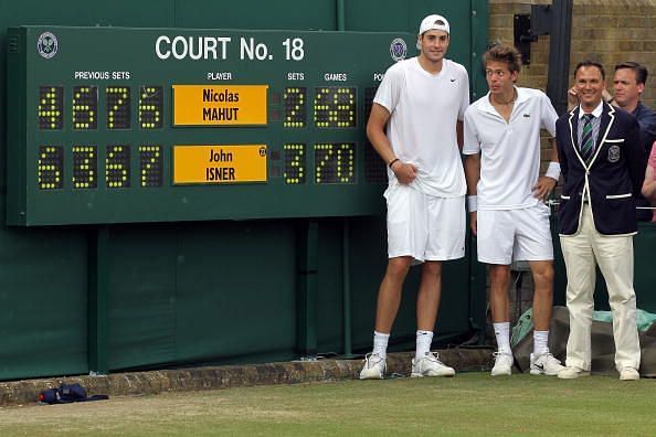 John Isner and Nicolas Mahut after their record-breaking Wimbledon match