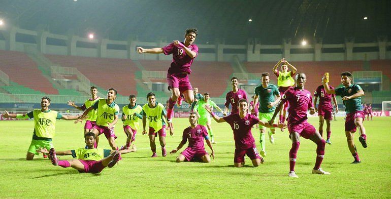 Qatar jubilant after entering the knockouts (Image Courtesy: The Peninsula Qatar)