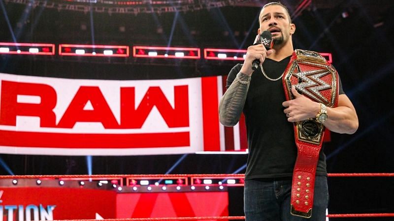 The chairman of the board stands with Roman