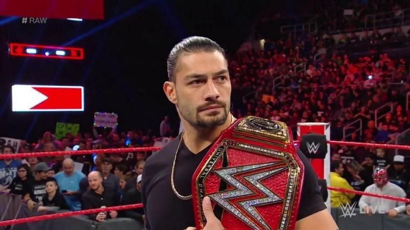 A tearful Reigns vacates the Universal Championship.