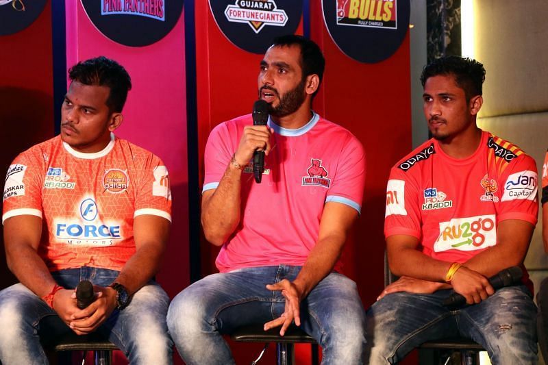 Rare sight: Anup Kumar (centre) in a Pink Panthers jersey
