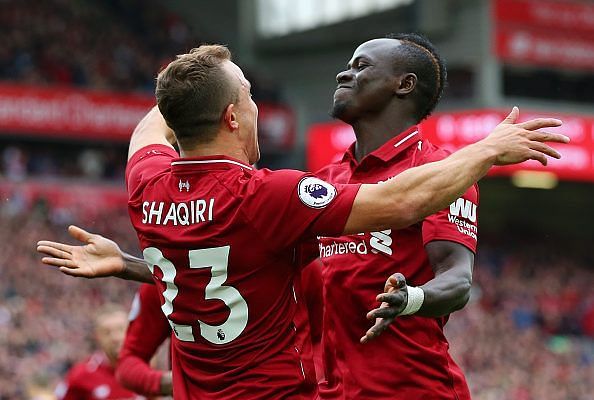 Xherden Shaqiri scored his first goal for Liverpool as Reds beat Cardiff City by four goals to one