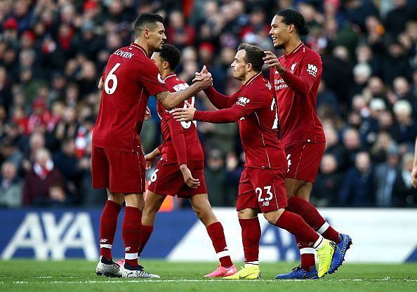 Liverpool players celebrate during their 4-1 over Cardiff City at Anfield