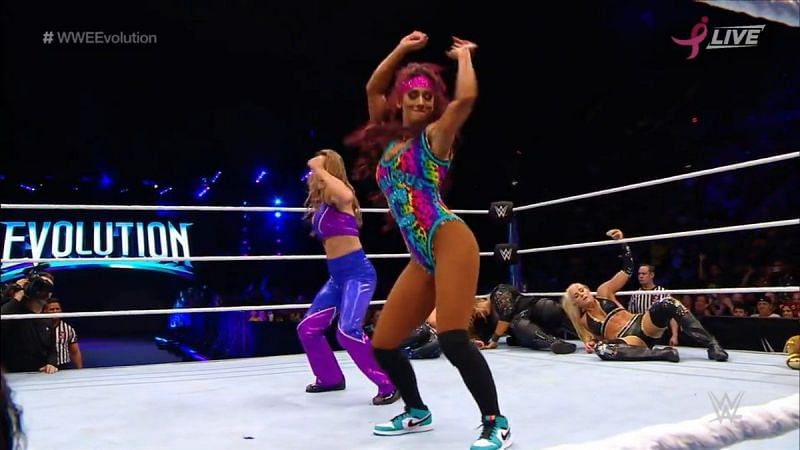 Carmella and Ivory pause the Evolution battle royal for a dance break