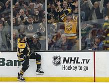 Pastrnak scored 3 goals, Bruins beat winless Red Wings 8-2