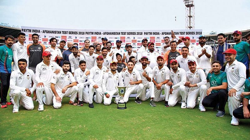 The Afghanistan team with the Indian team at the end of the Test Match